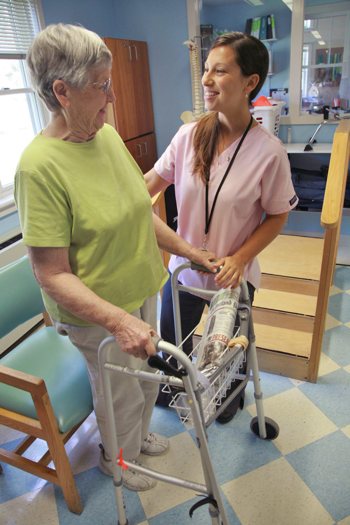 Occupational Therapist working with patient at Cove’s Edge