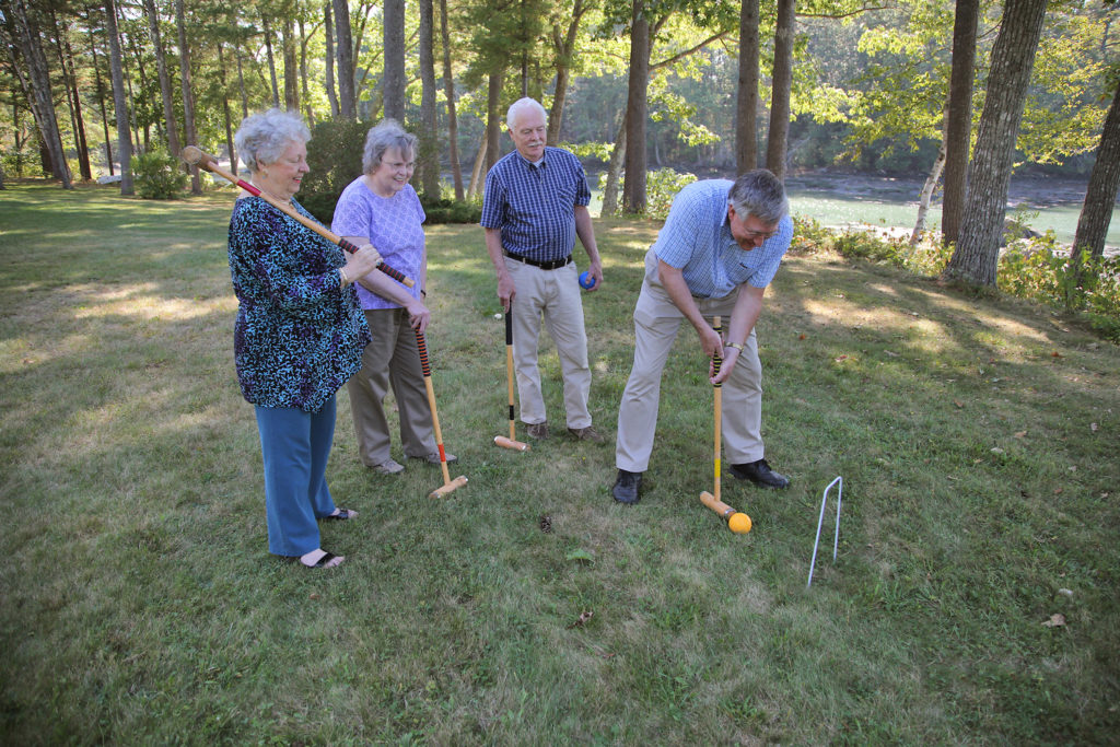 Residents enjoy playing yard games